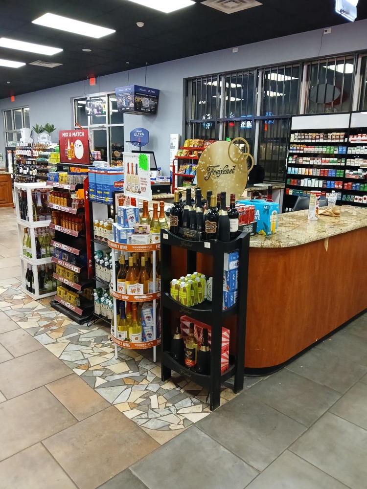 Express 64 convenience store section with snacks, essentials, and everyday items