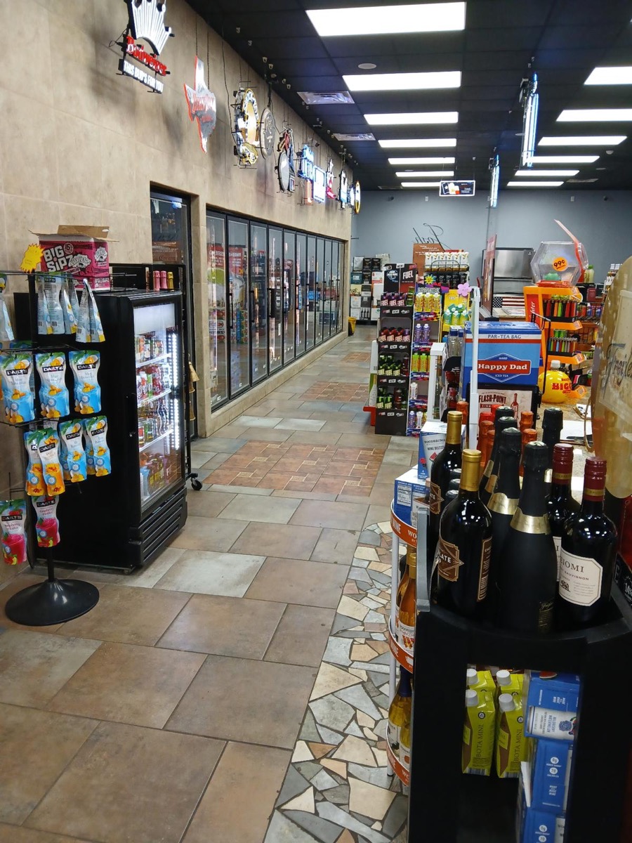 Express 64 modern store interior with organized beverage selection and convenience items